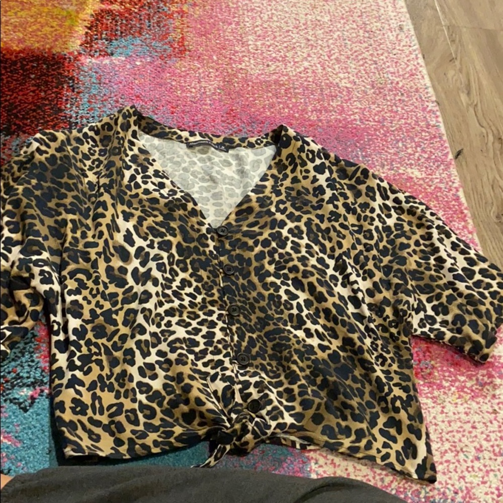 Animal print tie front woven blouse
